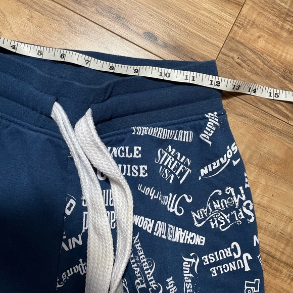 Disney blue and white jogger sweats with all of disneys ride names on it size xs - Picture 2 of 6